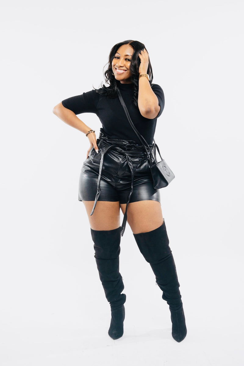 Leather shorts and shop thigh high boots